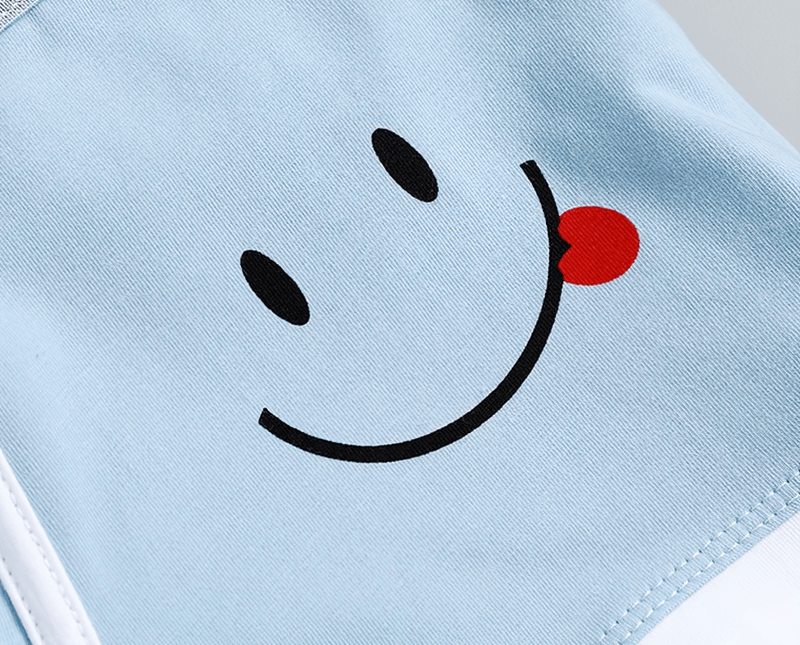 Light blue cotton boxer with a fun smiley face print for men, featuring a cheerful design and high-quality breathable fabric.