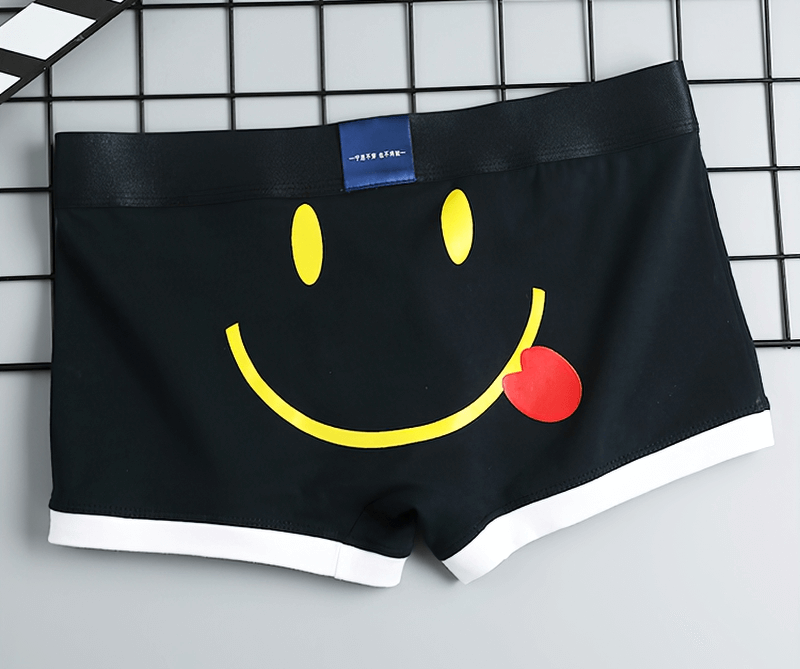 Black cotton boxer for men with a playful yellow smiley print. Comfortable and breathable male underwear, code SF0739.
