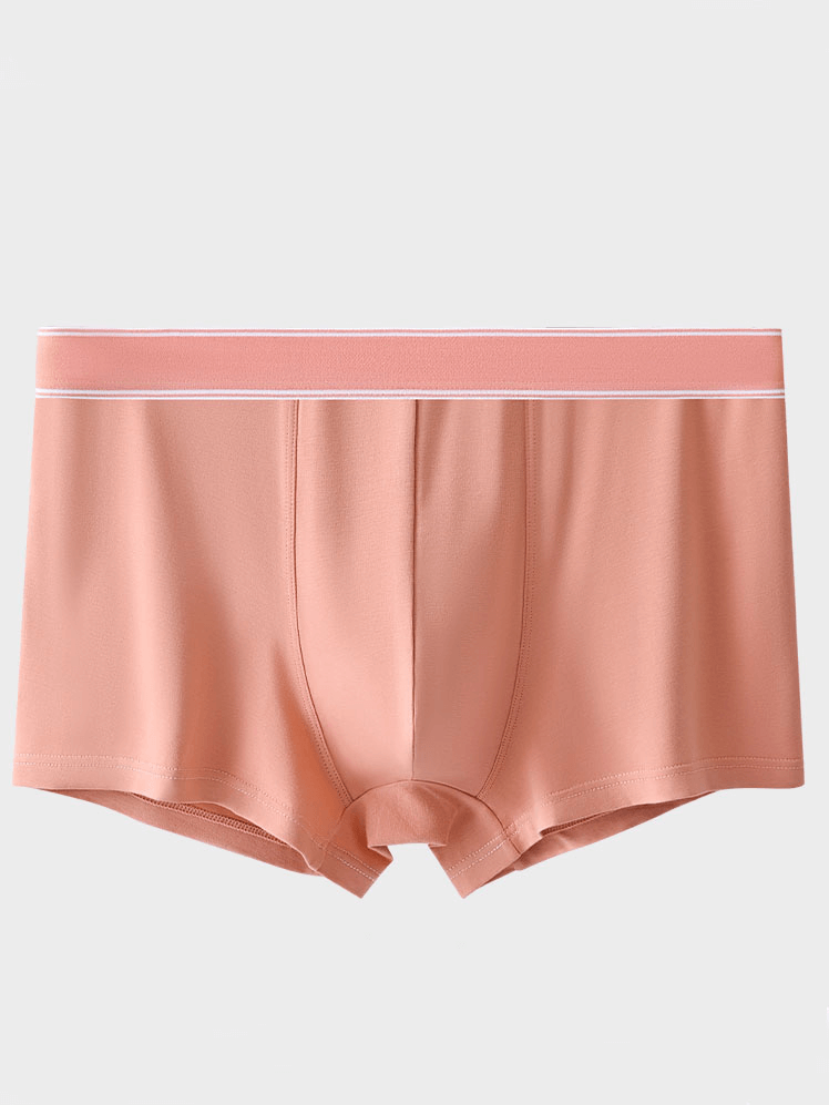 Men's soft cozy cotton boxer - breathable, middle-waisted fit for all-day comfort. Fashionable underpants in stylish peach color.