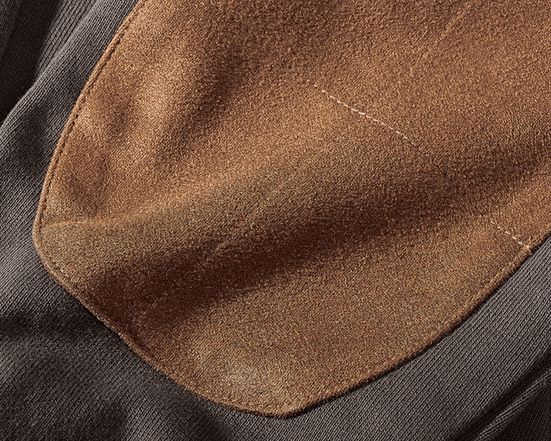 Close-up view of the kangaroo pocket on a solid color round neck sweatshirt, showing the fabric texture and stitching details.