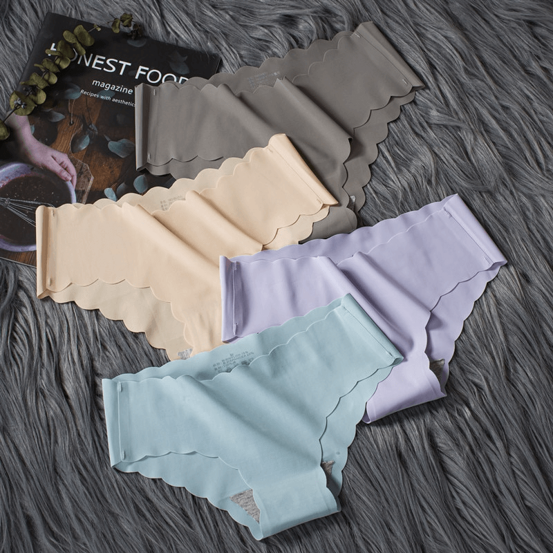 Solid color low waist ruffle stretch briefs in pastel shades, perfect for a seamless and comfortable fit.