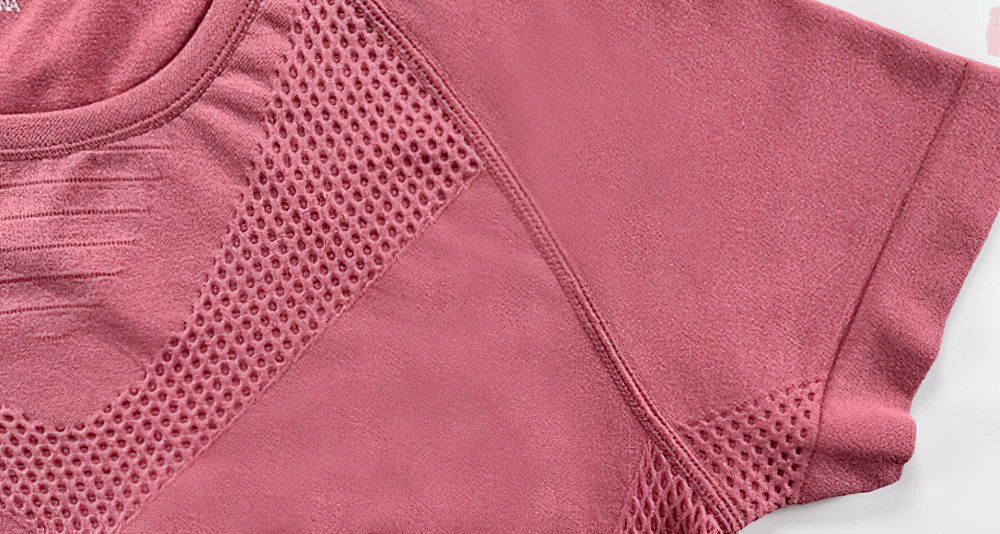 Solid Color Quick-drying Sports Short Sleeves T-Shirt for Women in pink, showcasing breathable fabric design for yoga and outdoor activities.
