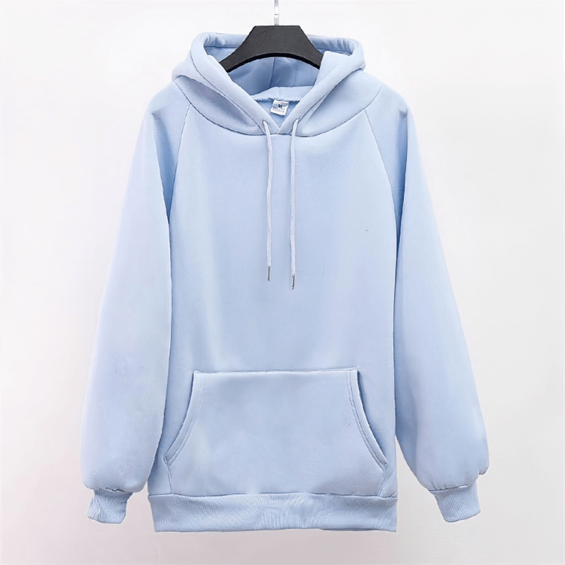 Light blue women's sweatshirt with front pocket and hood, made from a cotton and synthetic blend for warmth and comfort.