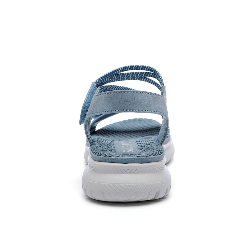 Back view of sport women's soft sandal with Velcro, featuring a blue PU leather strap and white TPR sole for comfort and style.