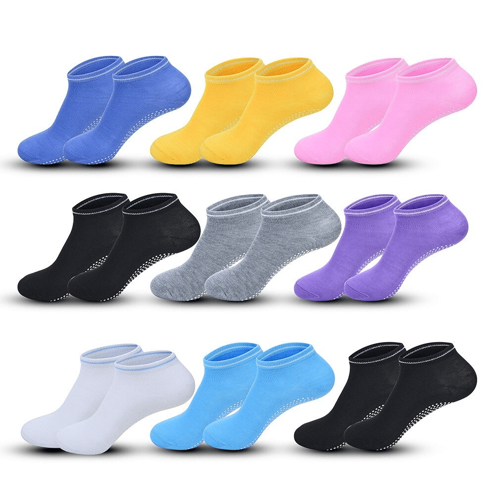Colorful array of sports anti-slip breathable women's socks in cotton, featuring massage granules for comfort and snug fit.