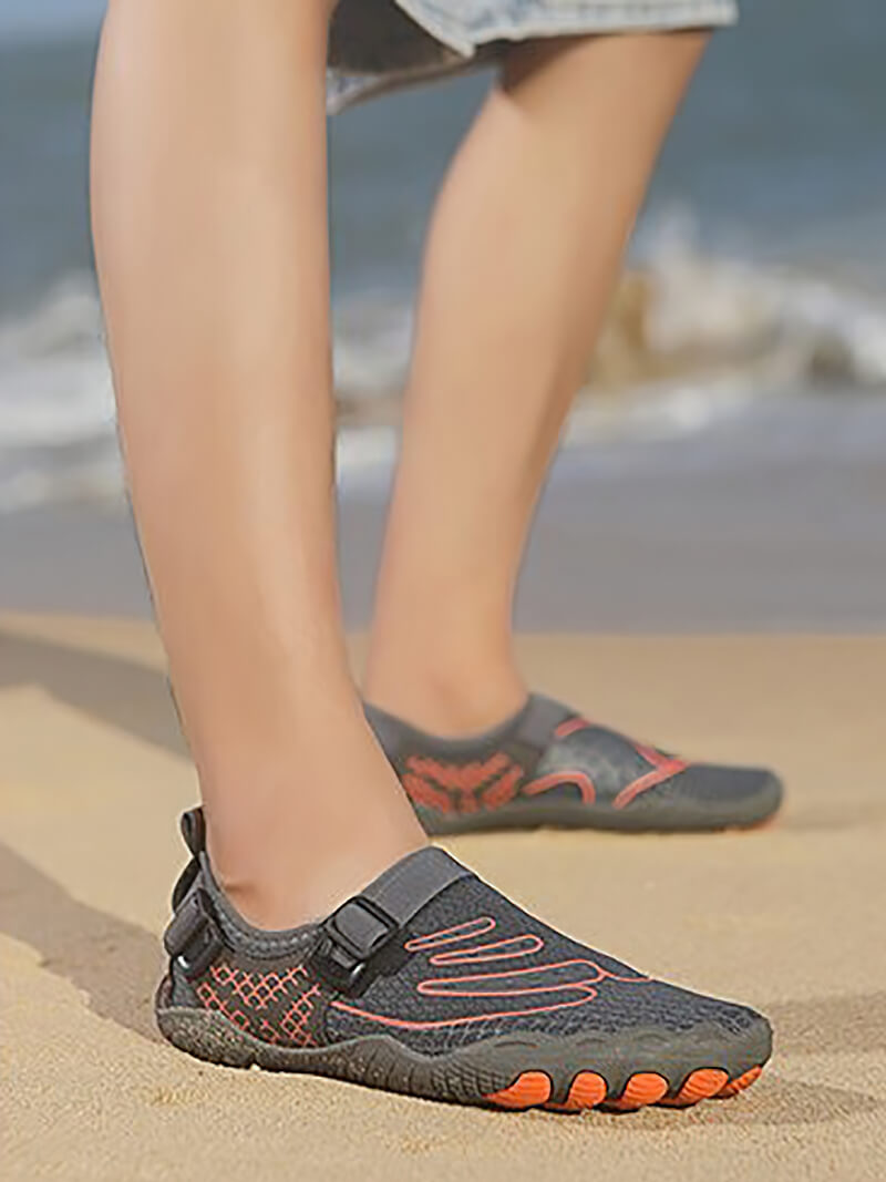 Unisex sports aqua shoes for swimming, synthetic upper, perfect for water sports and hiking, featuring TPR outsole, beach background.