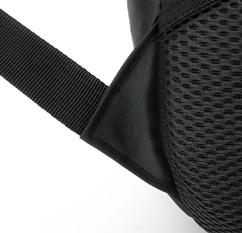 Close-up of black sports backpack's adjustable shoulder strap and mesh pocket detail, highlighting durability and design.