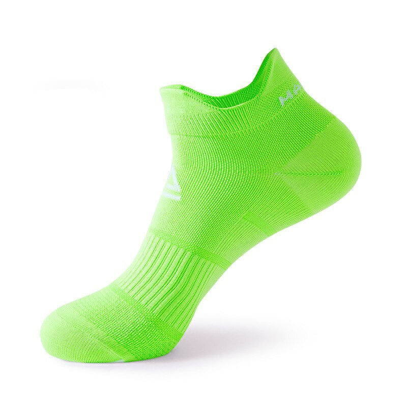 Bright green sports low-rise sock with breathable, elastic fabric for ankle support, designed for unisex use, perfect for athletics.