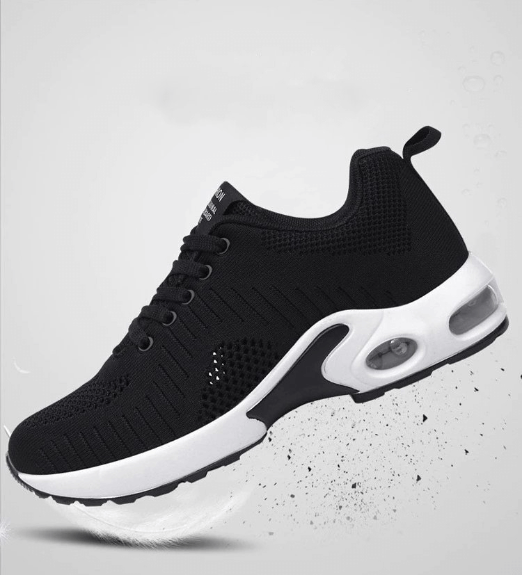 Black breathable women's running shoe with mesh upper, lace-up closure, and cushioned sole for support and comfort. Model SF0275.