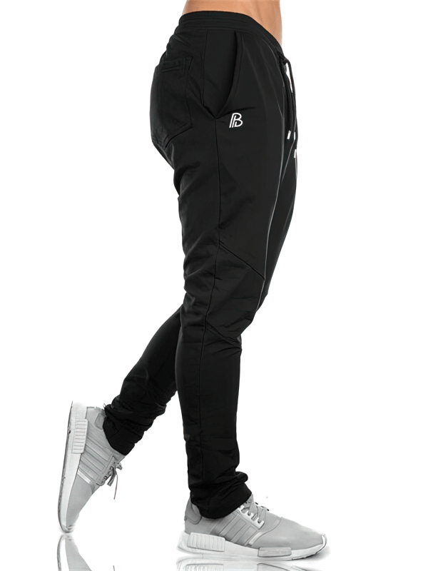 Sports Elastic Quick-Drying Men's Pants SF1117 in black, perfect for workouts, featuring drawstring closure and pockets.