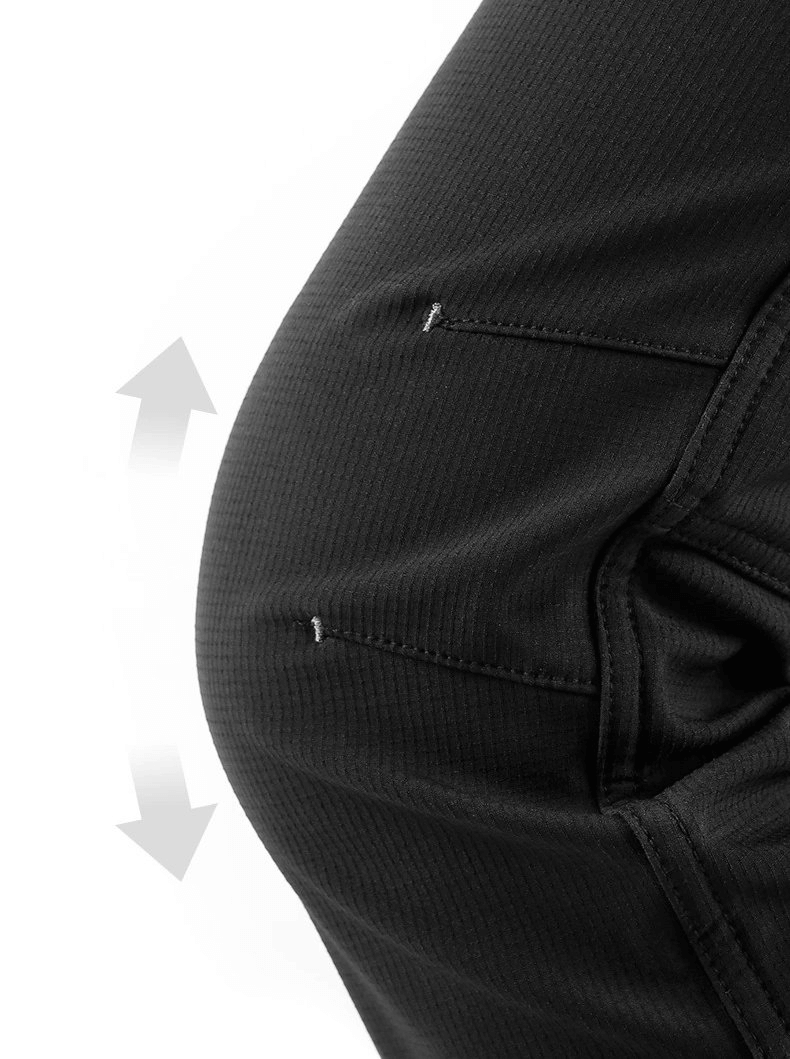 Close-up of elastic windproof women's hiking pants, emphasizing stretch fabric for comfort and freedom of movement.