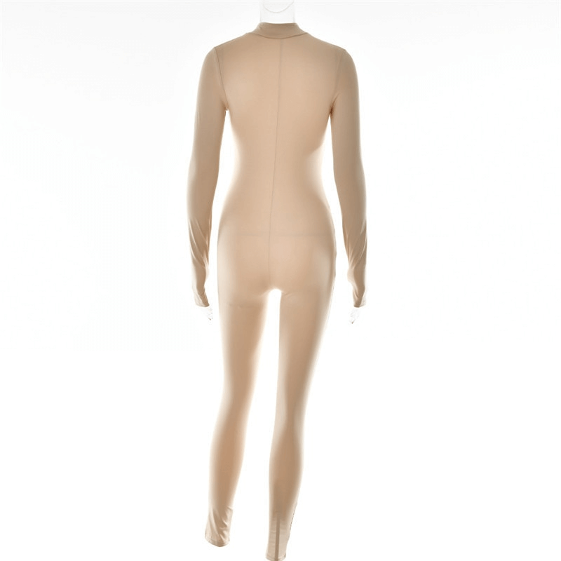 Back view of beige long-sleeve zippered jumpsuit showing sleek, stretchy design, ideal for sporty activities by women.