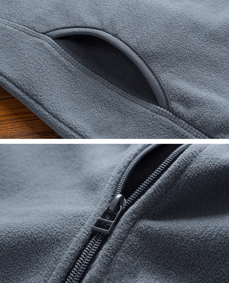 Close-up of Sports Fleece Men's Zip-Up Jacket with side pocket and zipper detail, highlighting design and craftsmanship.