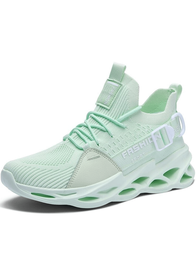 Mint green women's athletic sneaker with breathable mesh design, lightweight cushioning, and low heel for enhanced comfort and stability.