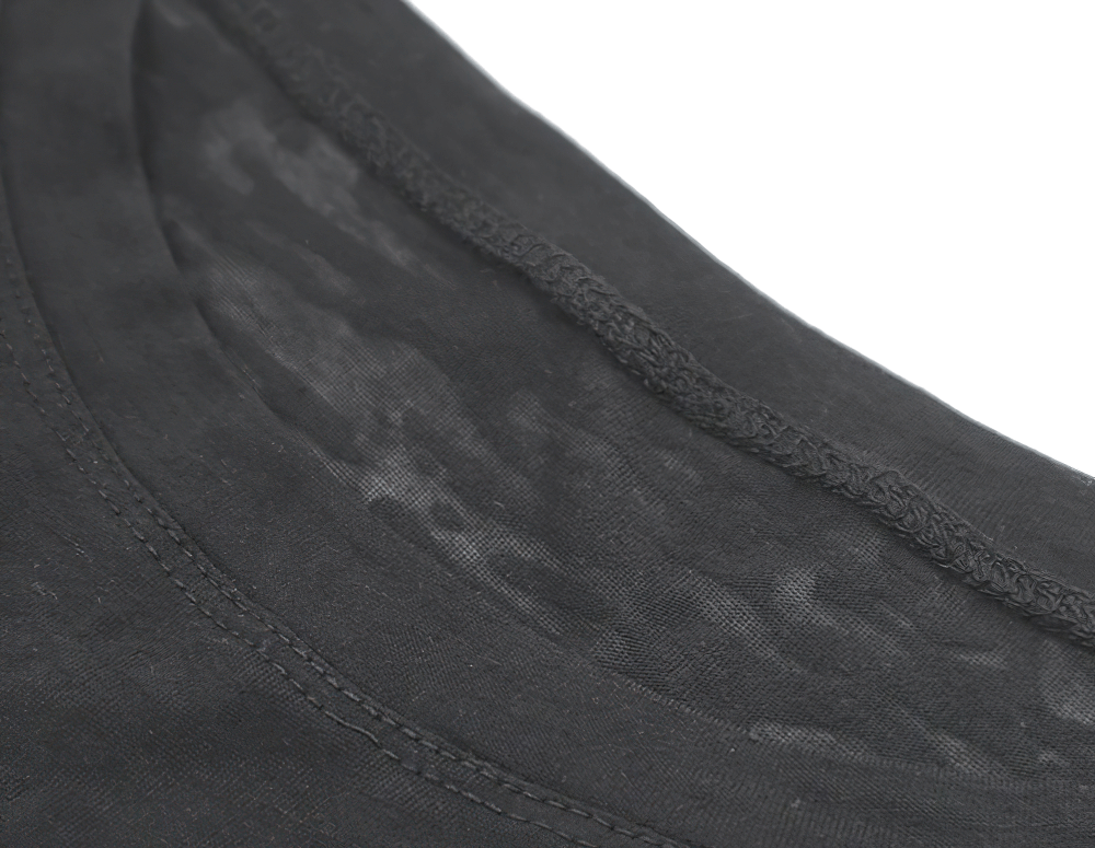 Close-up of black sports long-sleeved loose top neckline, showcasing breathable fabric perfect for yoga, gym, and fitness activities.