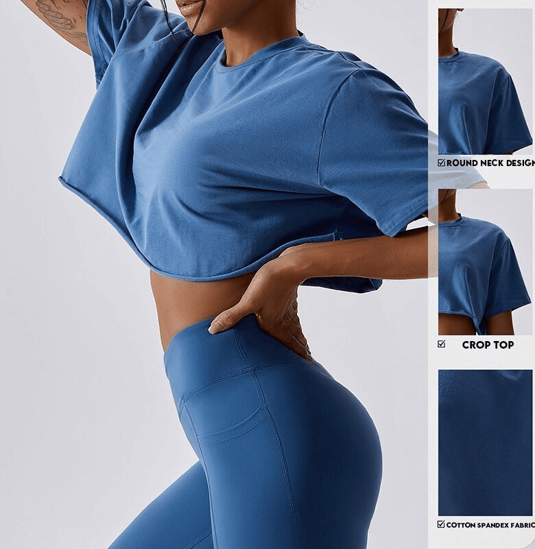 Woman wearing a blue sports loose crop top and leggings perfect for yoga, running, or gym workouts, featuring an O-neck and short sleeves.
