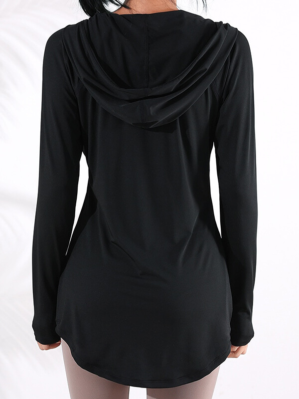 Back view of woman wearing black sports loose hooded sweatshirt, ideal for fitness, yoga, and running, featuring quick-dry technology.