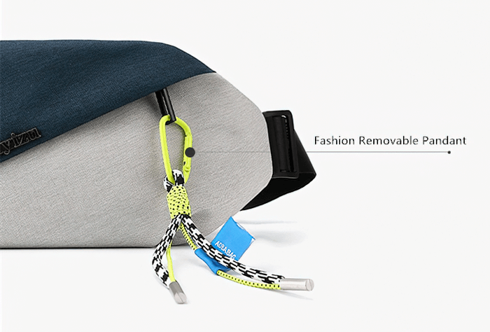 Close-up of sports men's waterproof crossbody bag with fashion removable pendant SF1226, highlighting stylish design and texture.