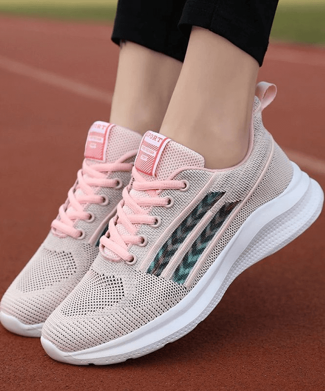 Alt Tag: Pink Sports Mesh Breathable Women's Shoes SF0212 on track, featuring EVA outsole and cushioned comfort for training.