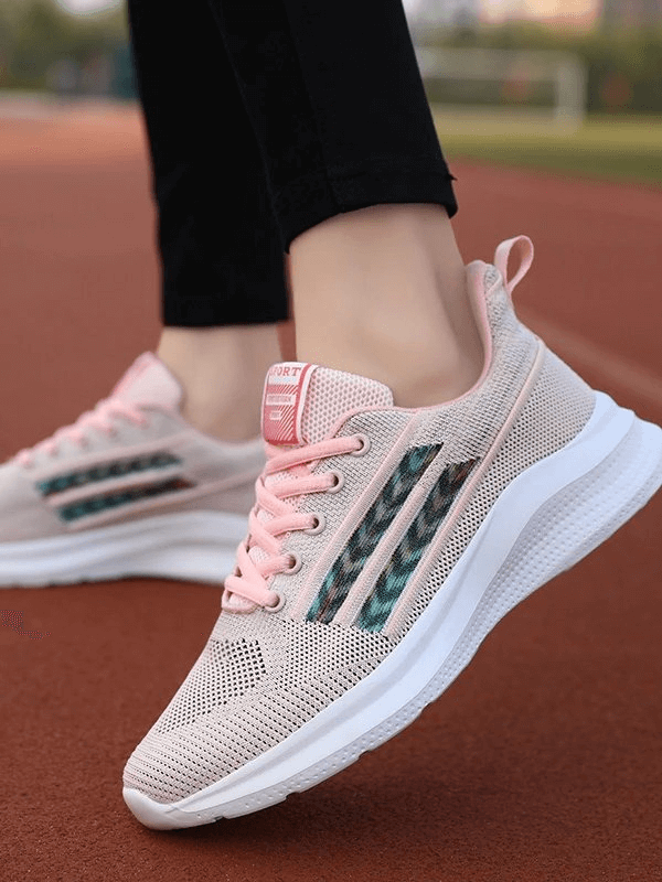 Stylish pink sports mesh breathable women's shoes for training on a track, featuring durable EVA outsole and lace-up closure, model SF0212.