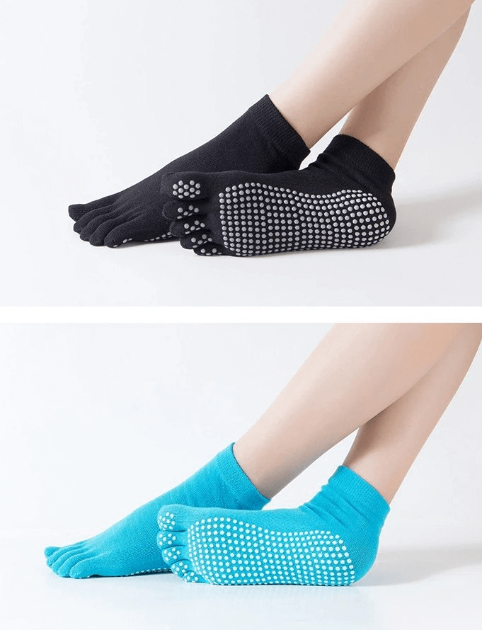 Black and blue non-slip quick-drying women's five-toe sports socks showcasing grip and comfort for yoga and fitness.