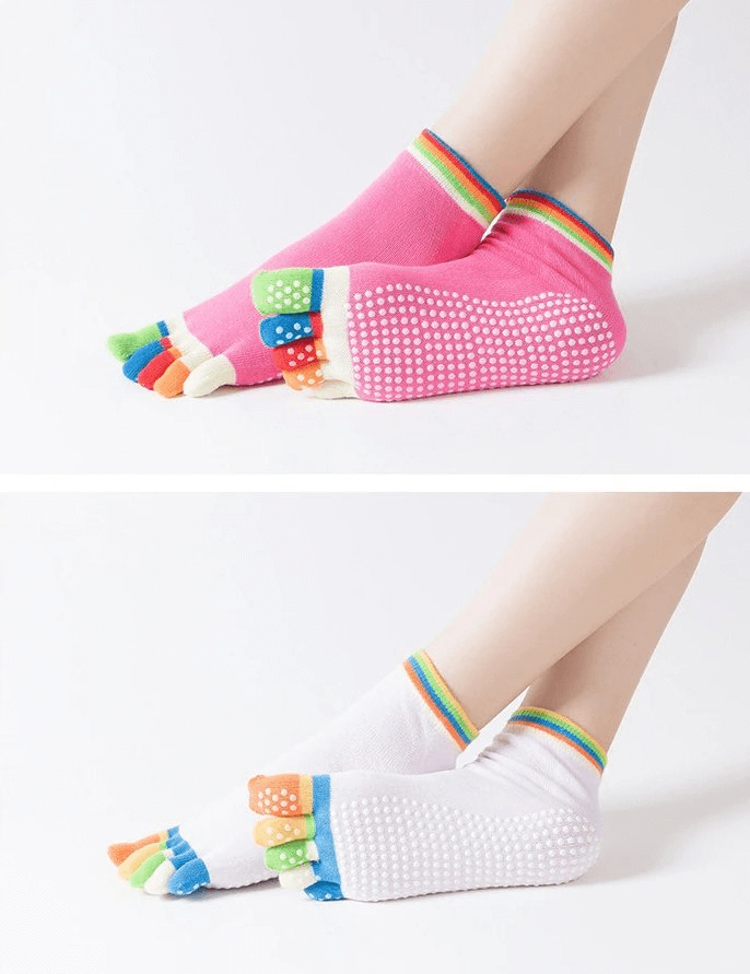 Vibrant non-slip women's five-toe socks in pink and white, featuring colorful toes and grip soles, perfect for yoga and sports.