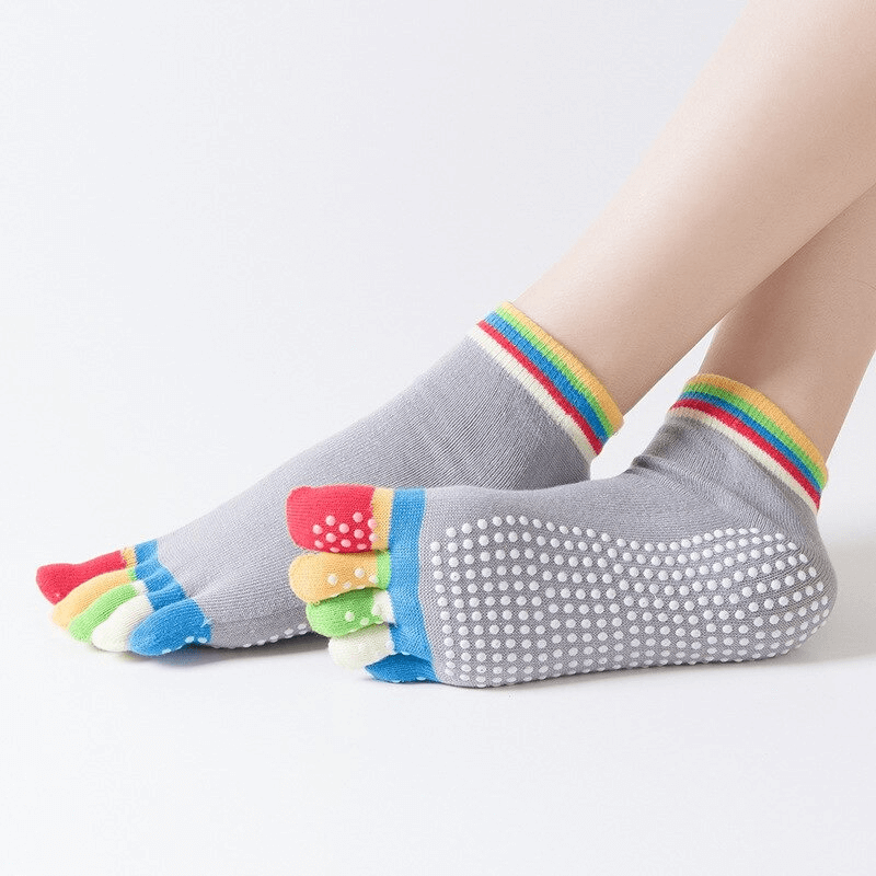 Colorful sports non-slip quick-drying women's five-toe socks, perfect for yoga and fitness, with rainbow accents and grip soles.