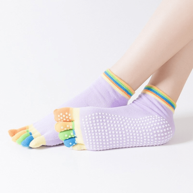 Colorful non-slip quick-drying women's five-toe socks perfect for yoga and sports, showcasing a snug fit and vibrant toe design.