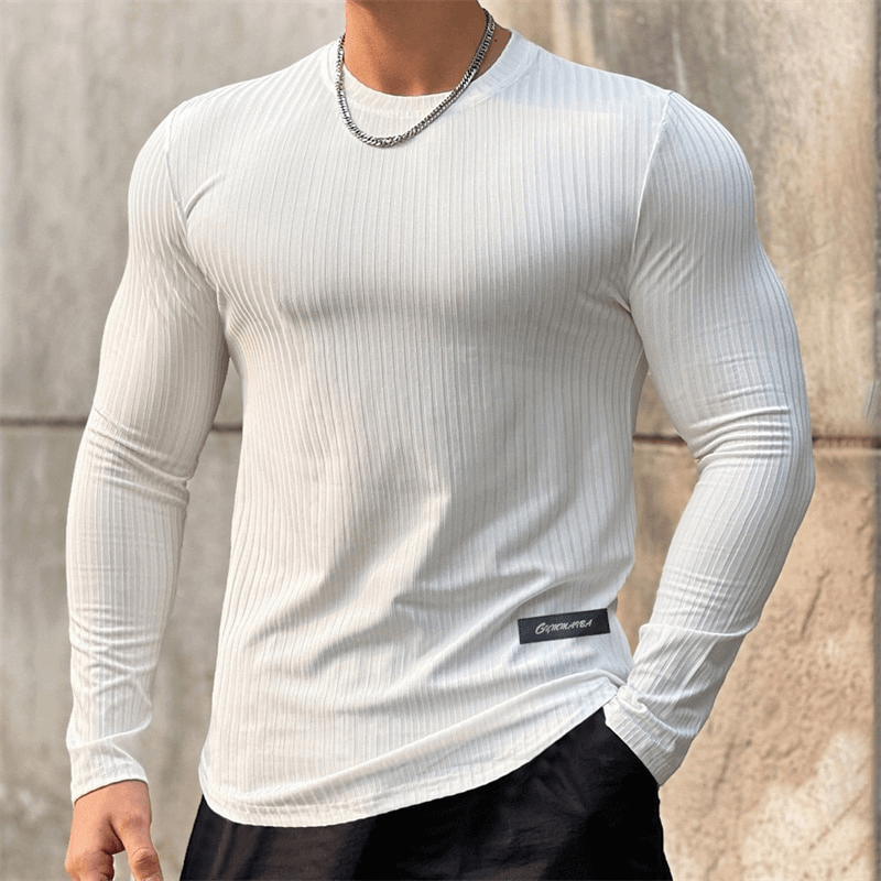 Man wearing a white sports quick-dry long sleeve t-shirt, perfect for the gym, with an O-neck collar and stylish striped pattern.