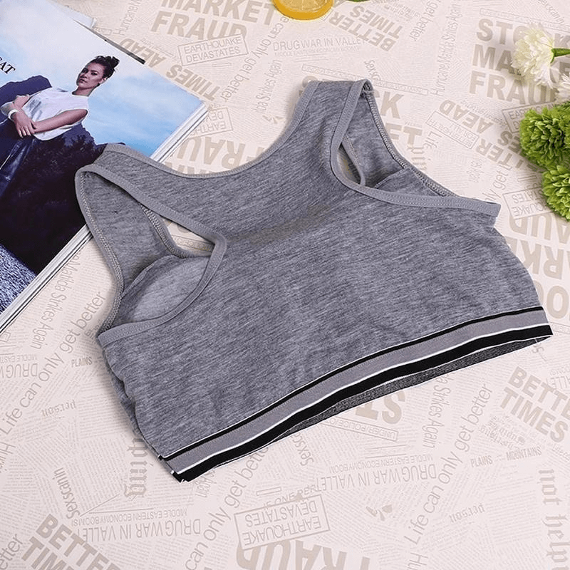 Sports quick-drying elastic top-bra with lining in grey, perfect for training and fitness.