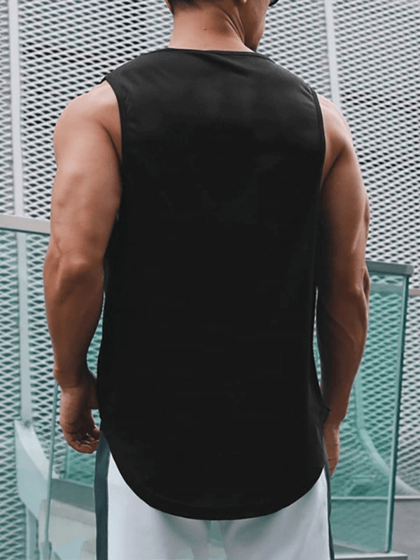 Back view of a man wearing a black sports quick-drying men's T-shirt for training, showcasing muscle fit and breathability
