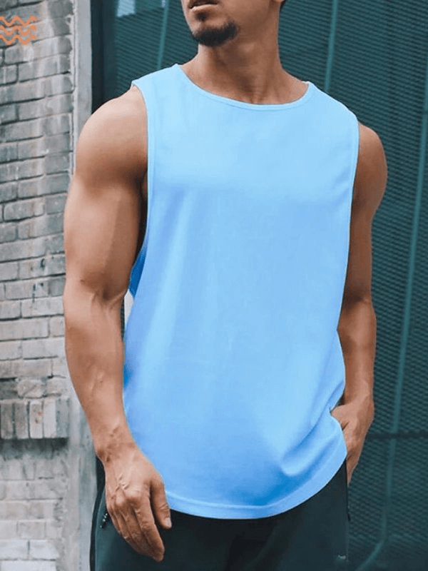 Man wearing blue quick-drying sports t-shirt, perfect for gym, running, or basketball training. Lightweight, breathable athletic wear.