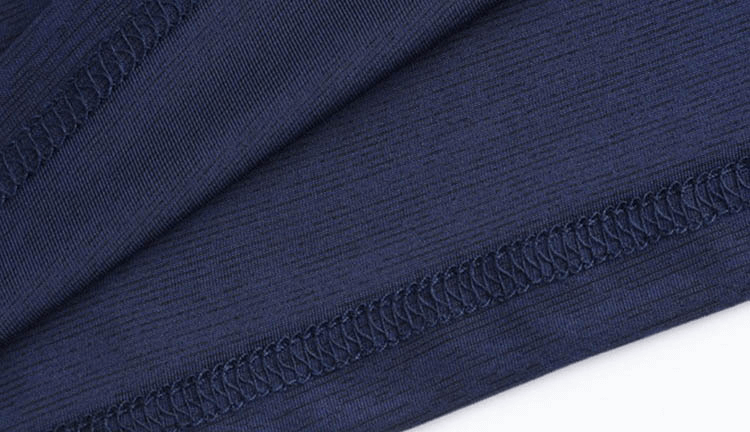 Close-up of navy quick-dry T-shirt fabric, showing detailed stitching and texture for breathable sportswear SF0351.