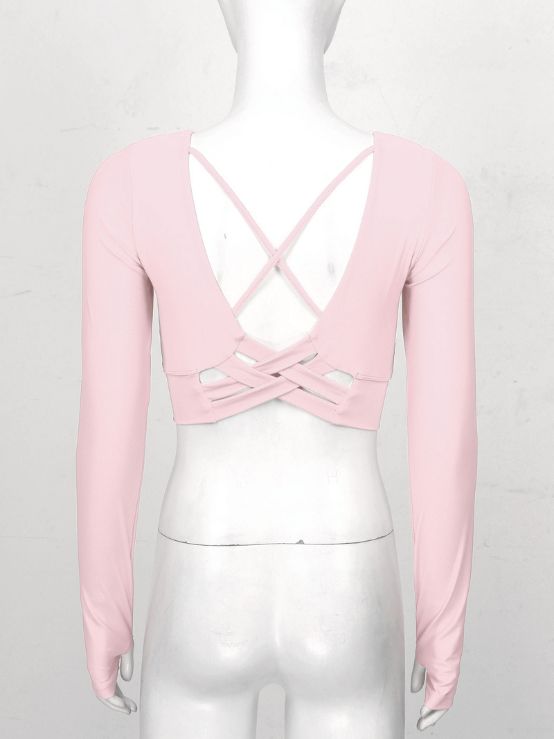 Sporty pink seamless cropped top with long sleeves and back cross strappy design, perfect blend of style and comfort for active wear.