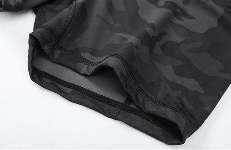 Close-up of black camouflage pattern on Sports Short Elastic Women's Training Shorts, ideal for comfort and style during workouts.