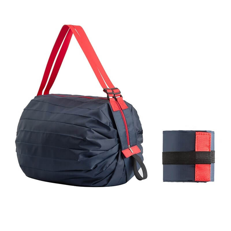 Lightweight waterproof sports shoulder bag for women in navy and red with compact foldable design, ideal for fitness and beach outings.