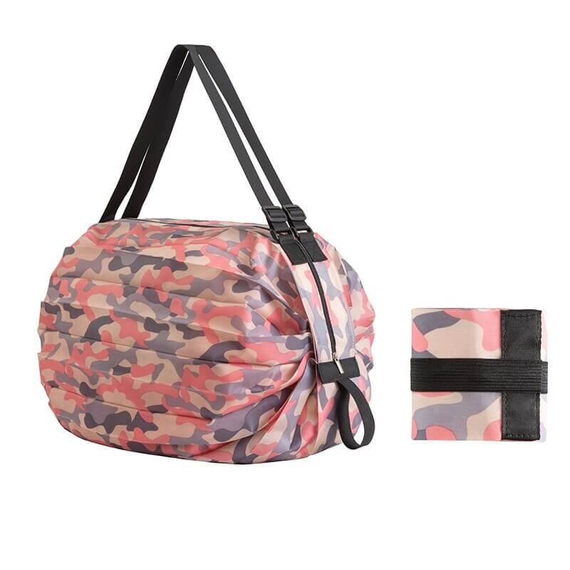 Camouflage lightweight waterproof shoulder bag for women, ideal for sports and beach days, shown with compact fold.