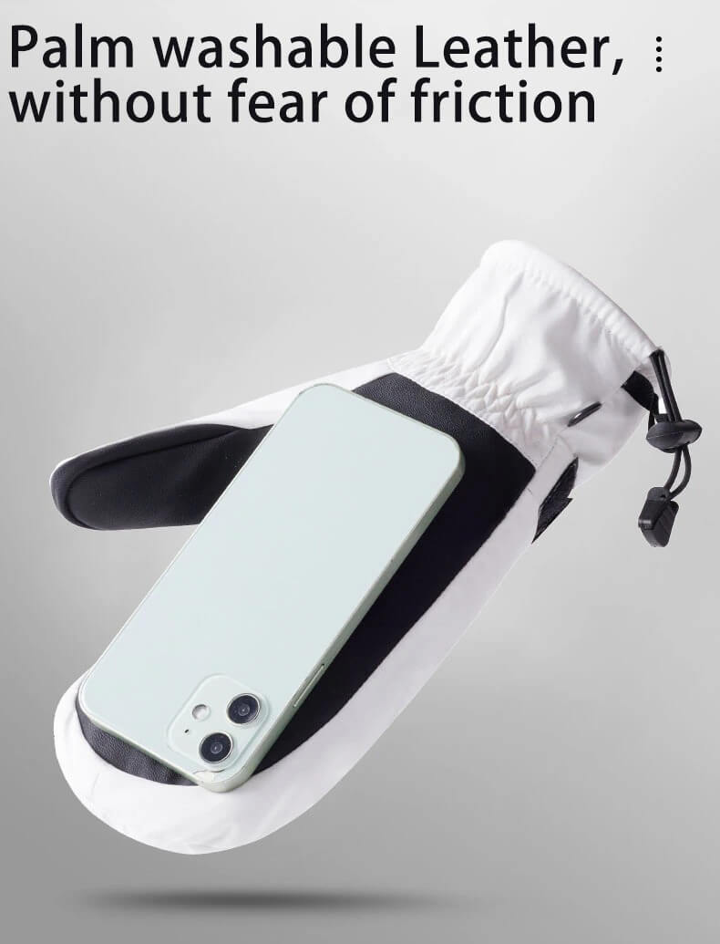 White skiing glove with touchscreen fingertip, holding a phone, illustrating its friction-resistant, washable leather palm.