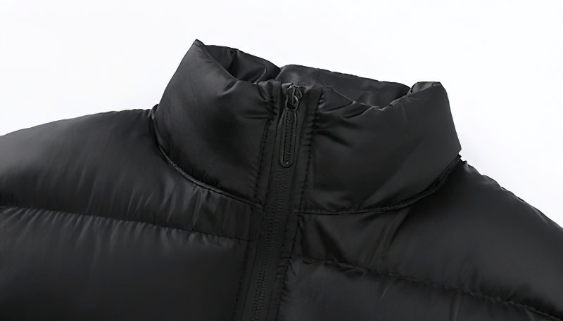 Black windproof football sleeveless jacket with stand collar and zipper closure for outdoor sports and training.