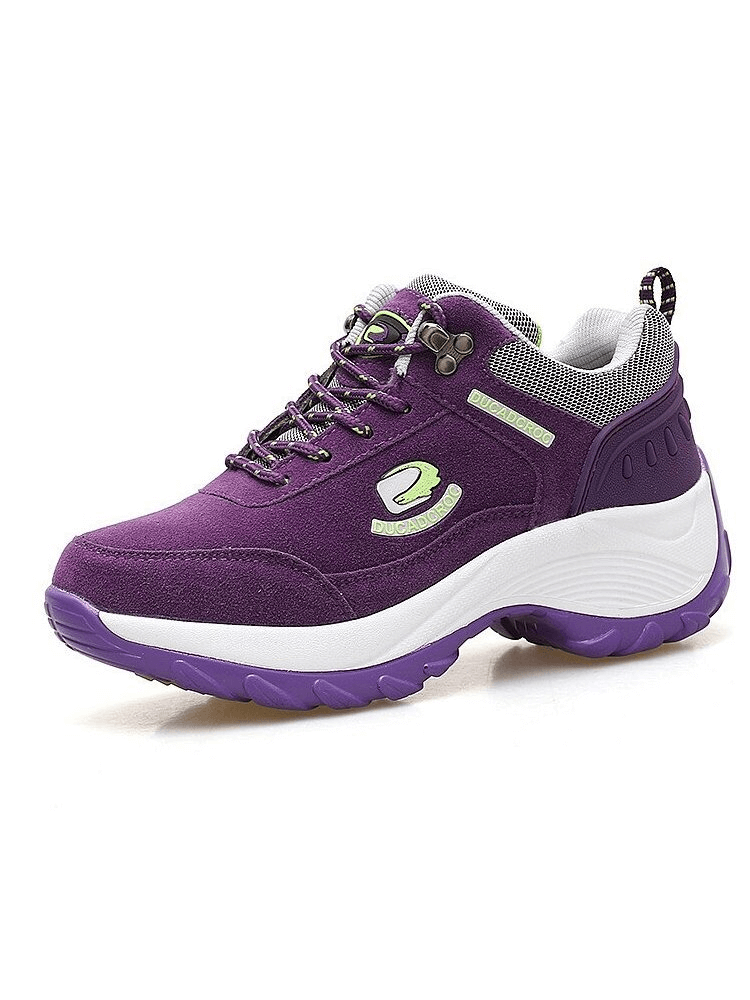 Stylish purple women's sports sneaker with suede upper and animal print, designed for stability and comfort, SF0258 model.