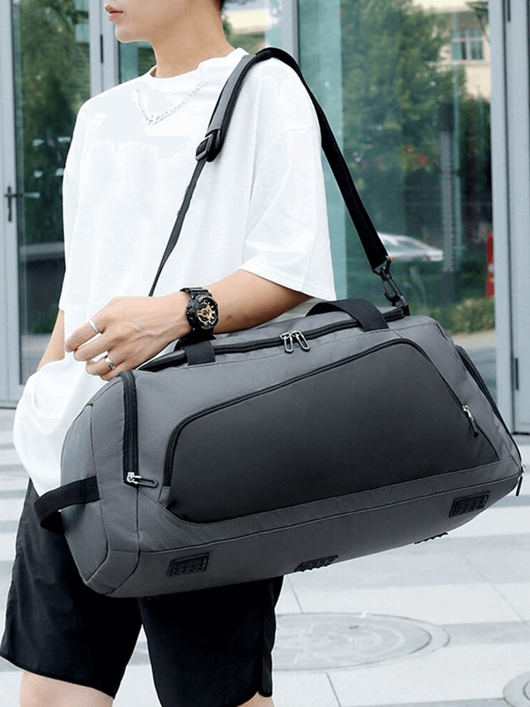 Person holding Sports Waterproof Portable Bag SF0874 with shoe compartment, highlighting durable design for fitness enthusiasts.