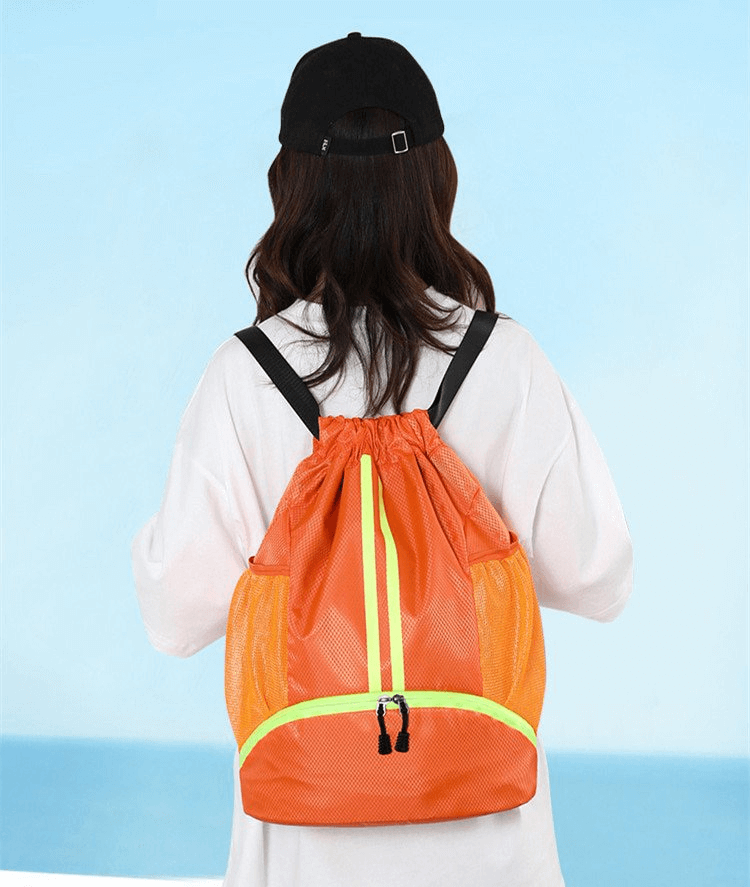 Orange sports waterproof shoe bag worn as a backpack, perfect for outdoor activities, with a 15L capacity and unisex design.