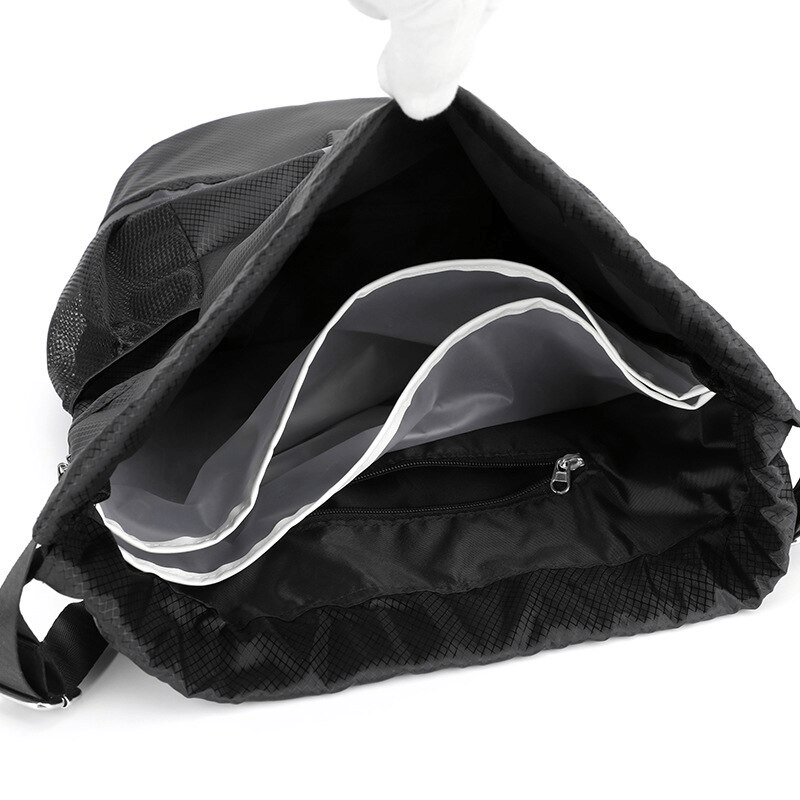 Open black waterproof sports shoe bag showing interior compartments, ideal for unisex use, perfect for outdoor adventures. Capacity: 15L.