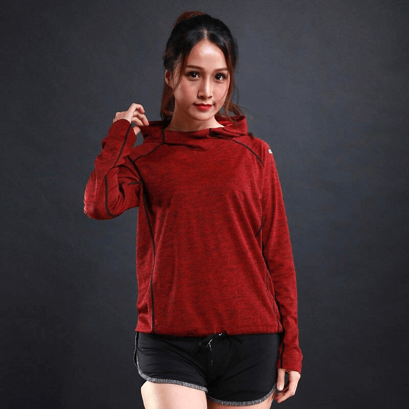Woman wearing red sports long sleeve reflective hoodie, fitness apparel, ideal for gym and running. Product code: SF0097.