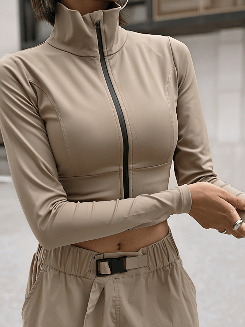 Khaki women's zipper jacket with mandarin collar, perfect for running and yoga. Stylish long sleeves sportswear for comfort and performance.