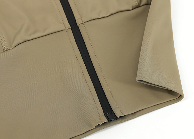 Close-up of khaki Sports Women's Zipper Elasticity Jacket, featuring a breathable fabric with a stylish black zipper detail.