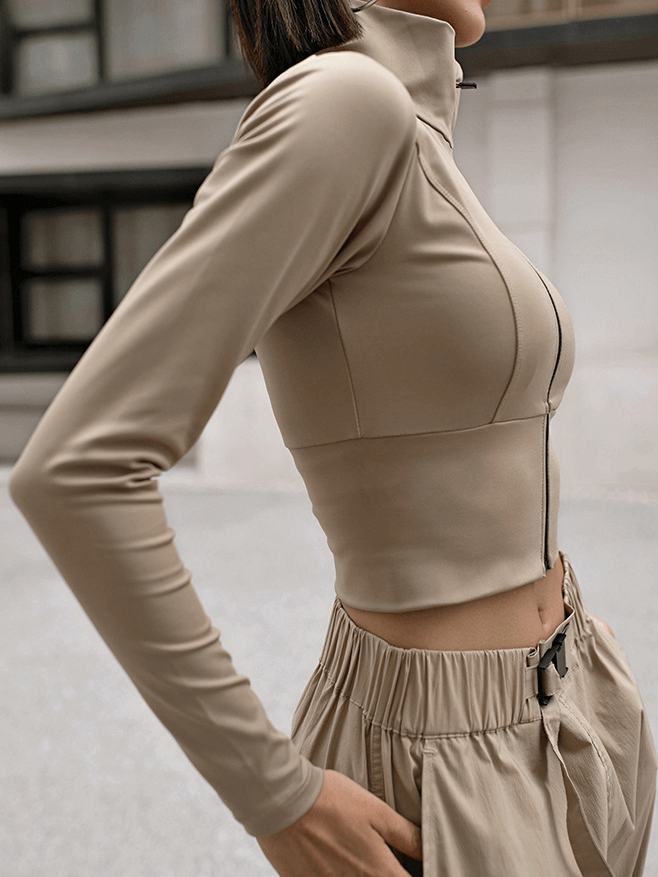 Women's khaki sports zipper jacket with long sleeves, designed for running and fitness, featuring a Mandarin collar and elasticity for comfort.