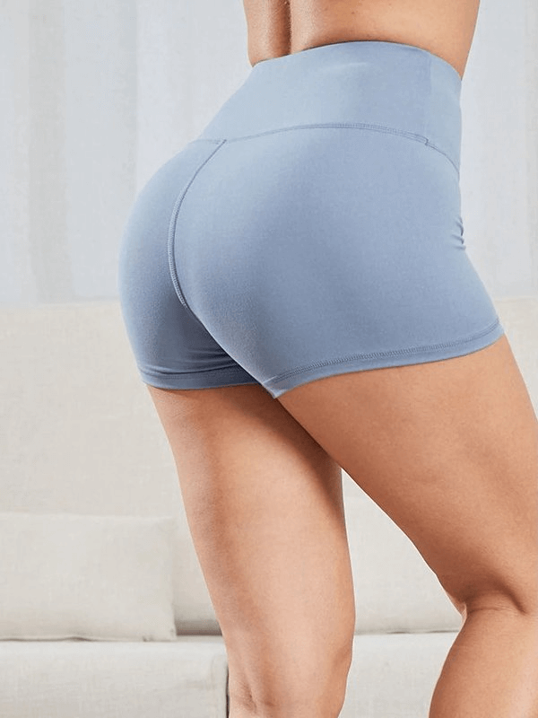 Sporty Elastic Women's Short Shorts for Training in blue, featuring high waist and solid pattern for comfort and mobility.
