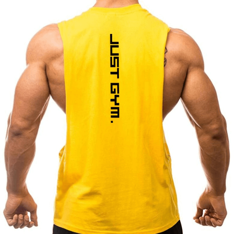 Back view of a man wearing a bright yellow quick-drying tank with 'Just Gym.' printed in bold along the spine, showcasing muscular arms.