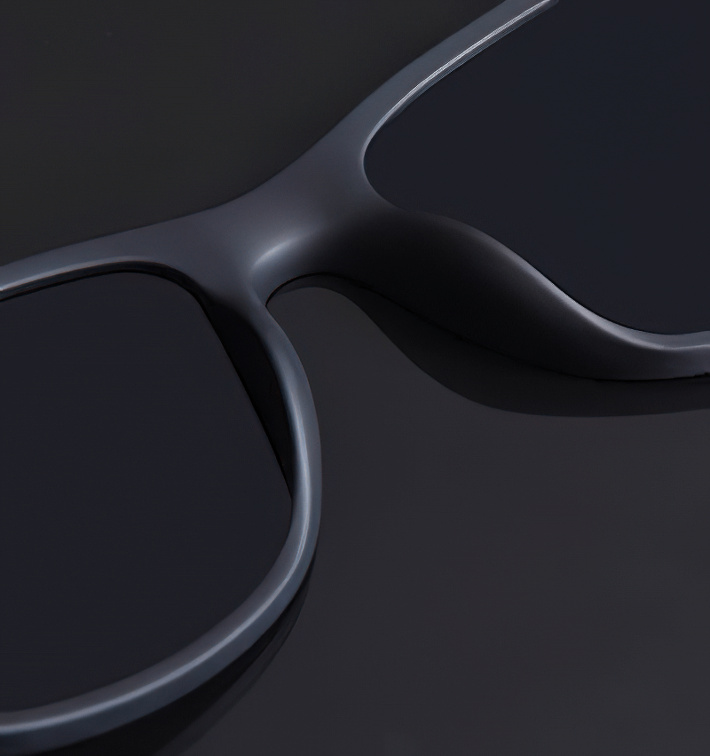 Close-up of black square-style ultralight polarized sunglasses with UV400 protection and sleek TR90 frame for unisex fashion.